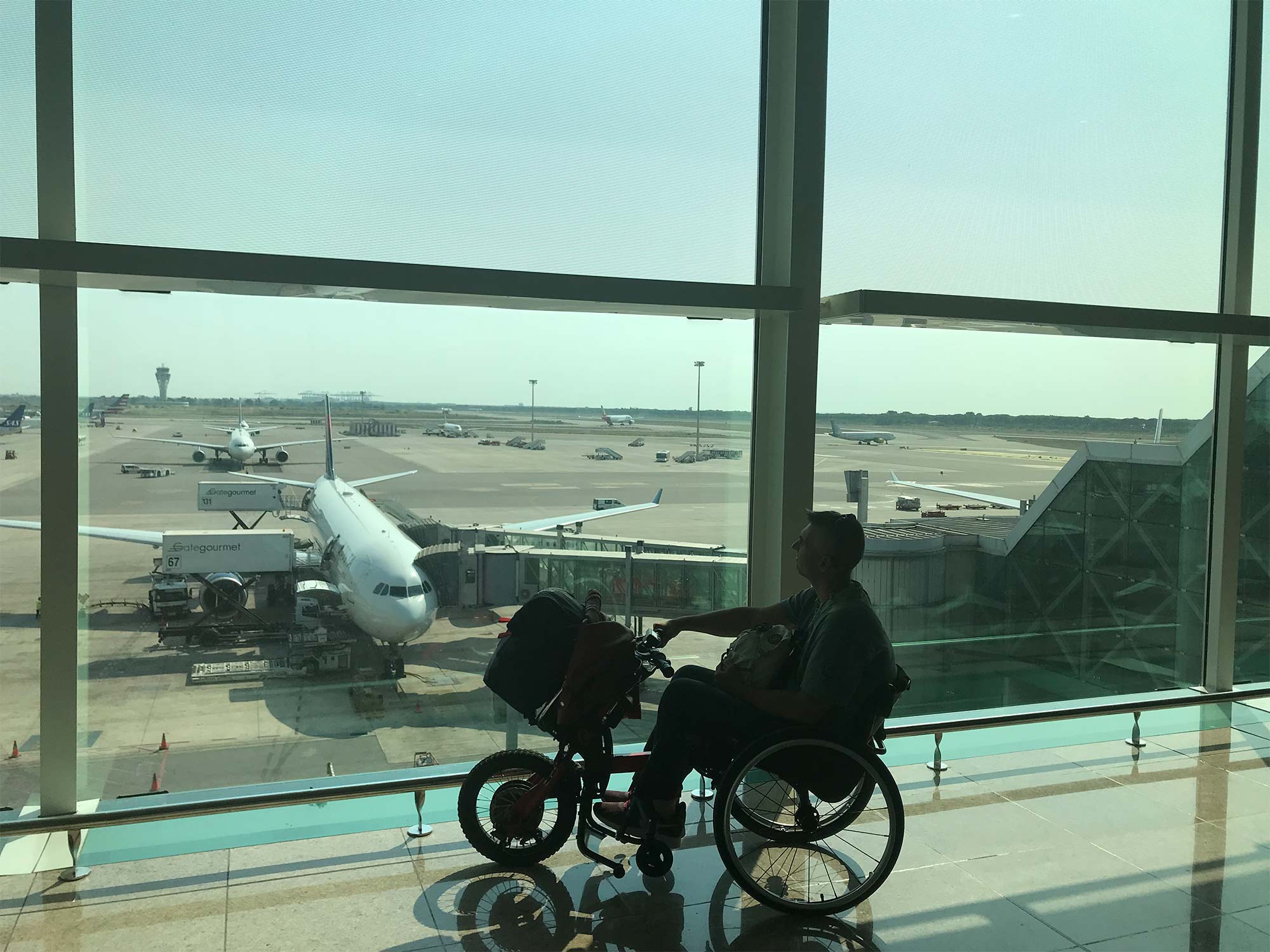 Navigating air travel with a wheelchair and handbike attachment