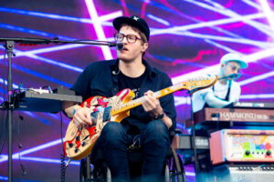 Eric Howk, Portugal. The Man guitarist during one of the band’s concerts.